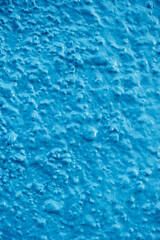 Wall backgroundwith blue wrinkled texture