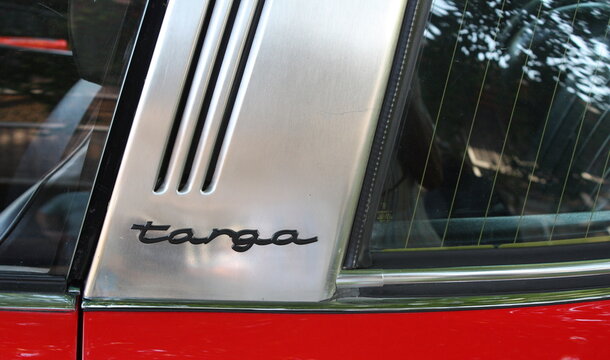 Targa lettering on the roll bar of a red Porsche Targa 911 E, at the vintage car meeting on September 10th, 2023 in the spa park of Bad Sassendorf, North Rhine-Westphalia, Soest district