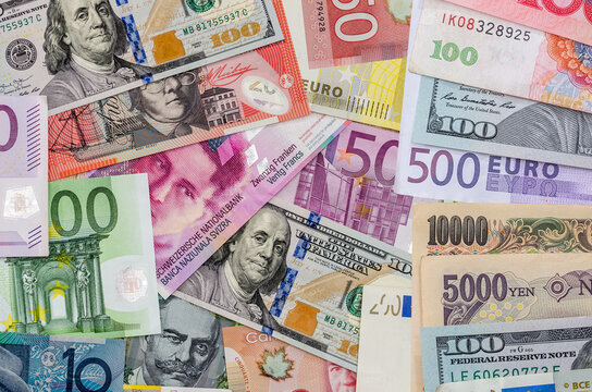 American dollars, European euro, Swiss franc, Canadian dollar, australian dollar bills