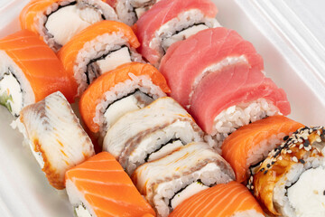 Sushi set with salmon and trout close-up.