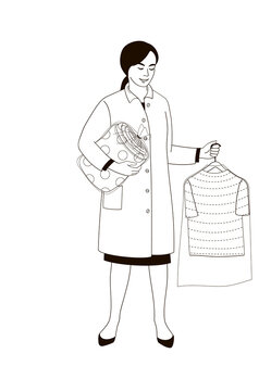 woman in a dry cleaning uniform with things on a hanger in her hands