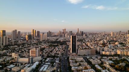 Sunset aerial view of Tel Aviv Yafo skyscrapers and Mediterranean sea