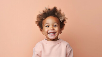 A young child in muted clothes beams while standing against a studio beige backdrop. Generative AI