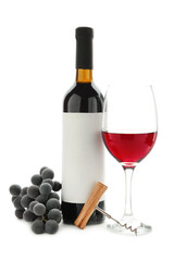 Ripe grapes, wine glasses and bottles of wine isolated on white