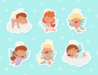 Fototapeta premium Cute Kids Angel Character with Wings and Nimbus Vector Sticker Set