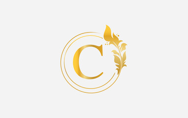 Golden leaf logo and golden circle monogram design vector. Golden beauty and business symbol