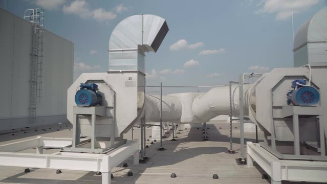 Heating and cooling air conditioner unit on roof. Gimbal stabilizer shot