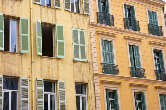 Facades of residential houses at French City of Toulon on a cloudy late spring day. Photo taken June 9th, 2023, Toulon, France.