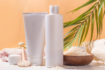 Rice Shampoo and Conditioner, organic rice water hair care. Natural beauty, organic fermented cosmetics with rice grains on background copy space