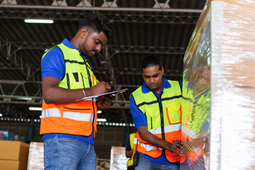 Waist of worker using document check and control production at plant with Modern Trade warehouse global business commerce concept

