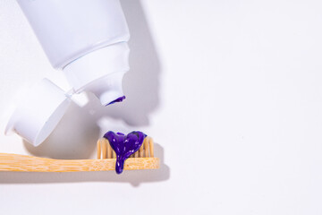 Trendy whitening purple Toothpaste, korean asian toothpaste with toothbrush and white...