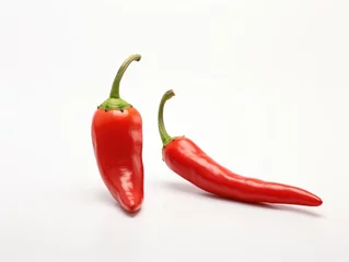 Fotobehang Two red chili on white background vertical © RWC