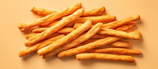 Chinese deep fried bread sticks alone on a isolated pastel background Copy space