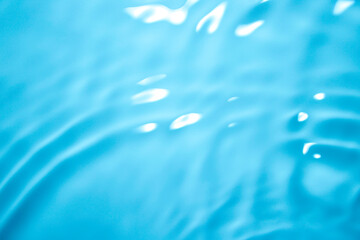 Naklejka na ściany i meble Water surface and blue waves.