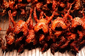 Ready to eat delicious Roast partridges sprinkled with white sesame on background