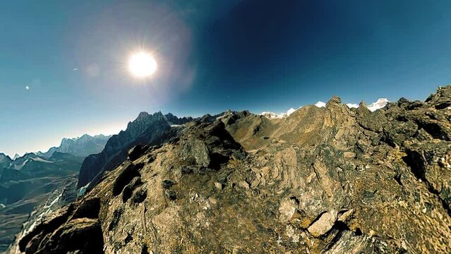 360 VR Gokyo Ri mountain top. Tibetan prayer Buddhist flag. Wild Himalayas high altitude nature and mount valley. Rocky slopes covered with snow. Tiny planet transformation.
