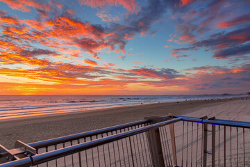 Colourful cloudy sunrise skies from the beach at Surfers Paradise. Gold Coast Australia. 