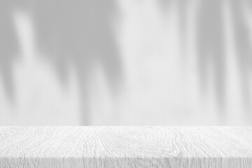 Minimal White Wood Table with Tree Shadow on Concrete Wall Texture Background, Suitable for Product Presentation Backdrop, Display, and Mock up.
