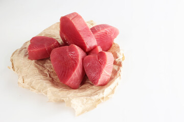 Tuna steaks on white background.Fresh fish. Useful omega. Copy space. Isolated object.