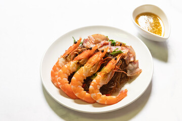 Shrimp potted with vermicelli; dipping black vinegar sauce or spicy seafood sauce. Main Ingredient...