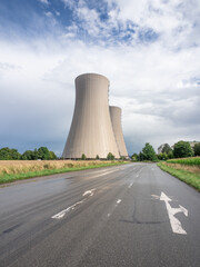 Green landscape and nuclear power plant.