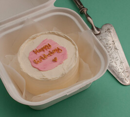 colored cakes with cream and various inscriptions