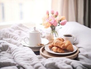 Fototapeta na wymiar Beautiful cozy breakfast in bed, home bedroom interior with bright morning light, healthy food on decorated tray, weekend meal