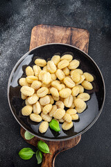 gnocchi raw potato food delicious second course Cooking appetizer meal food snack on the table copy space food background rustic top view keto or paleo diet vegetarian vegan food no met