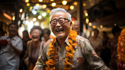portrait of an asian senior dancing happily at a party