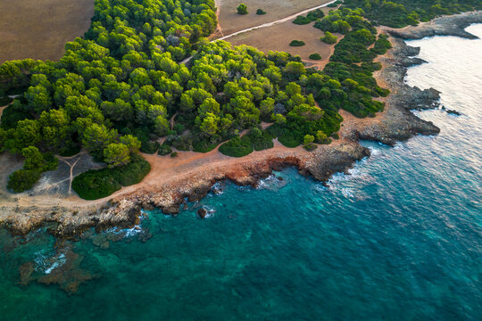 Mallorca rocky shoreline in Sa Coma Spain Mallorca seen from drone