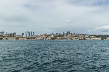View of bosphorus strait water at mid day with beautiful light and bridge with skyline