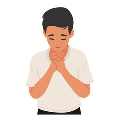 Young Child Boy Praying, Eyes Closed And Hands Clasped, Bows In Earnest Prayer, A Picture Of Innocence Seeking Solace