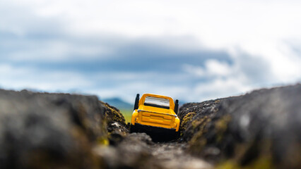 minahasa, Indonesia - January 11, 2023: toy car in the rice field