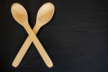 Wooden Spoon on black background