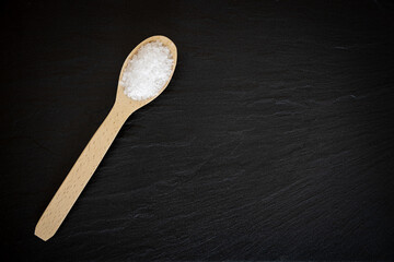 Salt on a wooden Spoon