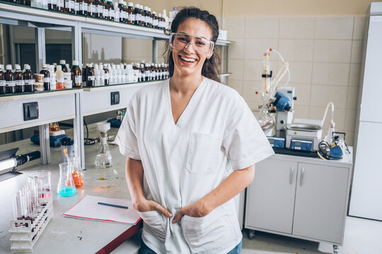 Portrait of female chemistry worker.	

