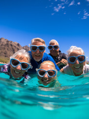 A Photo of an Elderly Group Snorkeling in Clear Blue Waters