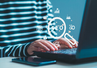 Woman using computer laptop to search for information On the concept of internet networks, SEO,...