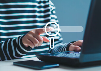 Smart women use laptop computers to find things that interest them. SEO with social media content...