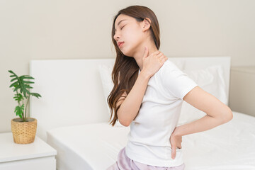 Pain body muscles stiff problem, asian young woman painful with back, neck ache from work hand...
