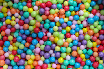 Fototapeta na wymiar Multicolor foam spheres texture for birthday celebration
