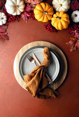 Thanksgiving charity dinner table setting, fall decorative festive table concept