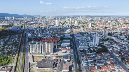Fototapeta na wymiar Visão aérea do bairro de Brás Cubas na cidade de Mogi dsa Cruzes captada do alto por um drone