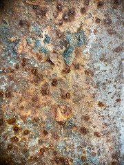 Old rusty metal background or texture. The texture of the copper background is covered with a patina, Rusty patterns on iron, Multicolor wooden texture background, grunge wood abstract.