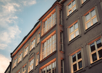Fototapeta na wymiar Apartment windows, Munich old town at Sunset, Germany