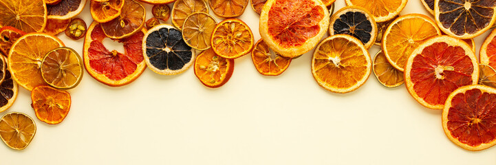 Banner of dried citrus, fruits sliced orange and tangerine, lime and lemon, kumquat and grapefruit...