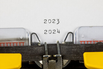2023 - 2024 written on an old typewriter	
