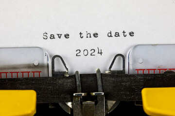 Save the date 2024 written on an old typewriter	
