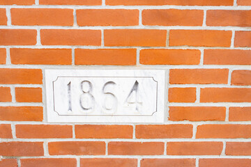 Fototapeta na wymiar stone house number date