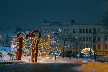 decorations square near shopping mall Christmas eve evening street festive December